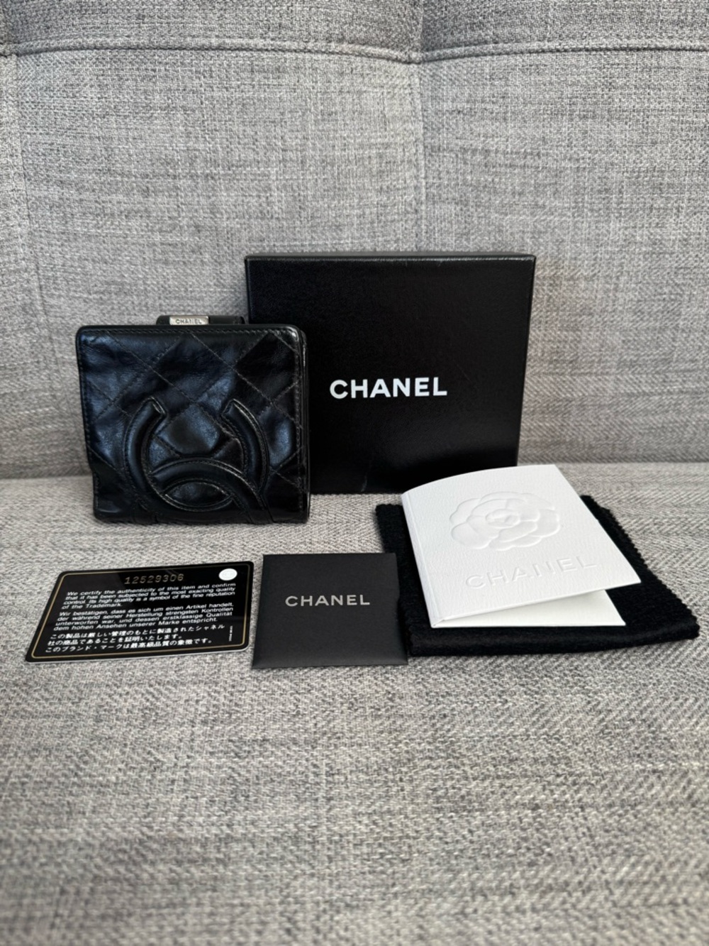 CHANEL Black Quilted Lambskin Card Case with Embossed CC
